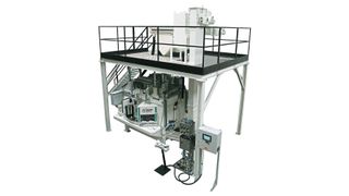 Zum Kugelstrahlen von Getriebewellen konzipierte Turbinen-Strahlanlage zum Einbringen von Druckspannungen. (Rösler Oberflächentechnik)