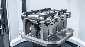 Der flexible Heller-Rundspeicher kann sowohl 630 Millimeter x 630 Millimeter als auch 800 Millimeter x 800 Millimeter große Paletten lagern und verarbeiten – sogar im Mischbetrieb. Das macht die gesamte Fertigungsanlage besonders flexibel. (Bild: Heller)