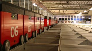 Meilenstein für Swisslog: Die Schweizer haben jetzt ihren 1000-sten Kompaktlager-Roboter Autostore verkauft. (Bild: Swisslog)