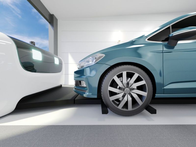 ... und hebt anschließend das Auto an den Vorder- und Hinterreifen an.  (Stanley Robotics)