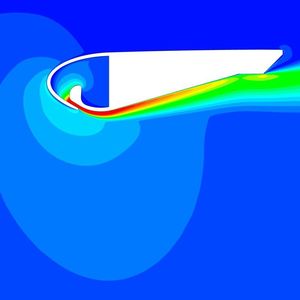 Der Querschnitt durch den Ventilatorring verdeutlicht die Geschwindigkeitsverläufe: Die sich langsamer bewegende Luft (dunkelblau und hellblaue Bereiche) innerhalb des Rings wird beschleunigt indem sie über ein Rampe und dann durch eine enge Öffnung gezogen wird (grüner, gelber und roter Bereich).
