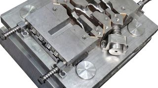 The multi-directional forging tool forms metal not only through pressure from above, but also through simultaneous pressure from the sides, resulting in less burr. (IPH)