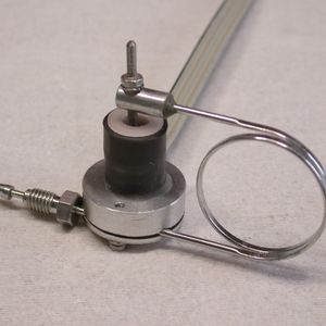 Abb. 2: Drucksensor mit Bourdon-Feder zur Messung und Differentialtransformator zur Erzeugung eines elektrischen Signals.