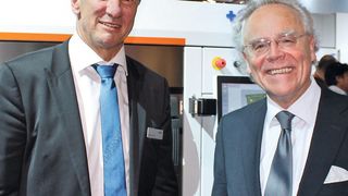 Pascal Boillat (left), head of GF Machining Solutions and Dr. Hans J. Langer, founder and CEO of EOS, talked to ETMM editor Barbara Schulz at EMO Milano 2015. (Source: Schulz)