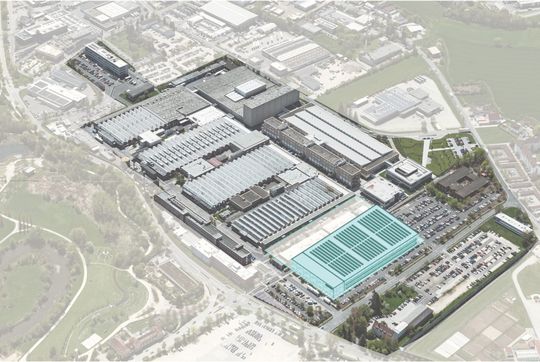 Luftbildaufnahme des bestehenden Standorts, ergänzt um eine Visualisierung der Smart Factory. Auf dem heutigen Parkplatz soll die neue Fertigung entstehen.  (Bild:  Siemens)