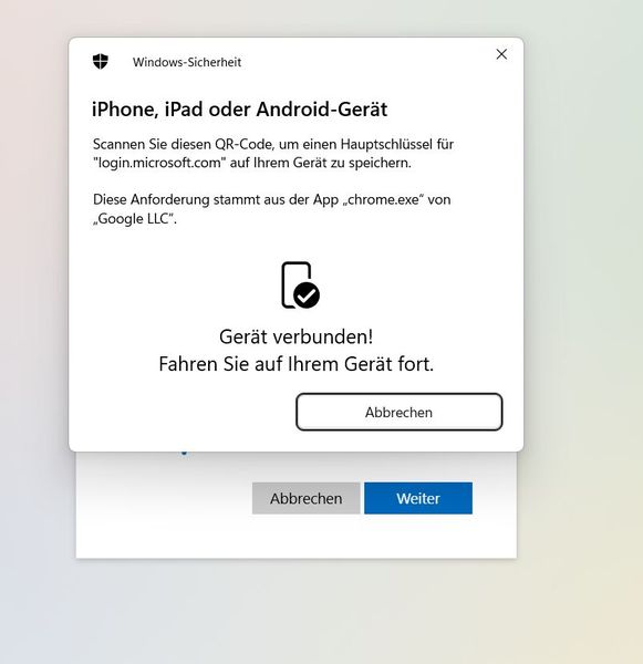 Der Windows-Sicherheitsdialog speichert einen Passkey per QR-Code auf einem iPhone oder Android-Gerät und meldet 