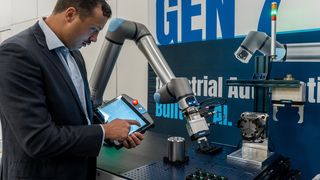Christopher Savoia, Global Head of the UR+ Ecosystem at Universal Robots, presents the new SP7 Smart Panel on a UR17g-1300 robot during the unveiling of Gen 7—UR’s 7th-generation robot platform—at IMTS in Chicago on September 14, 2026. (Image:Image: Teradyne Robotics)