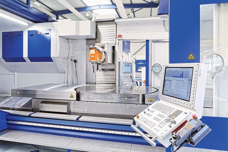 Der Fibro Rundtisch bei dieser BFR24 misst 1800 x 1400 mm und ist zwischen zwei Starrtischteilen platziert. Die 5-Achs-Maschine wurde von Reiden mit einer zusätzlichen B-Achse ausgestattet. Ein zweites Bedienpult ermöglicht einen optimalen Einblick in den Maschinenraum.  (Fibro)