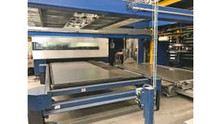 Automatisation du magasin de 435 palettes qui dessert le laser, le pliage et le secteur serrurerie.    (Patric métal SA)