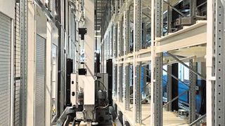 The robot slide transports the castings from the loading station to the shelves.  (Strack Norma)