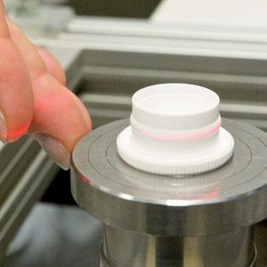 G250 capsule lid transfer wheel