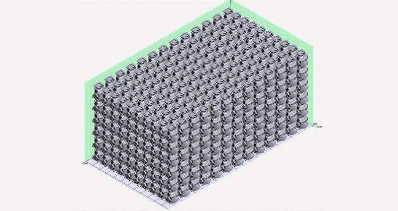 Ein gedruckter Zweitaktmotor und zum Vergleich der 3D-Bauraum einer VX1000 gefüllt mit 780 dieser Zweitaktmotoren. (Voxeljet)