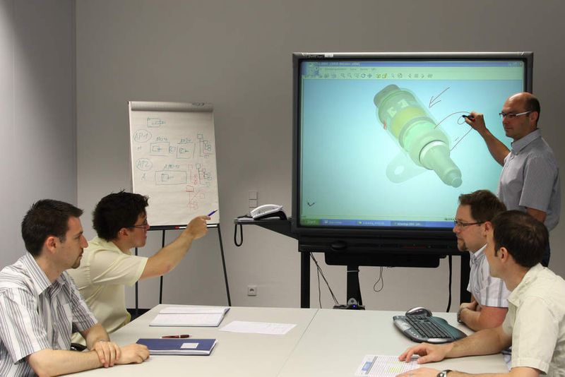 2 Bei der Arbeit: Das Audi valvelift system Team. (Archiv: Vogel Business Media)