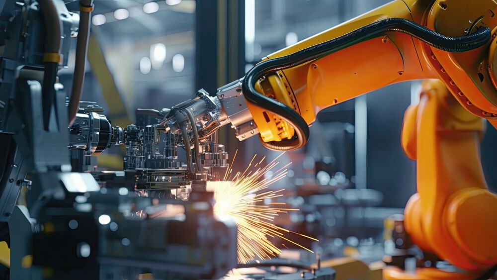 What advances the development of industrial robots