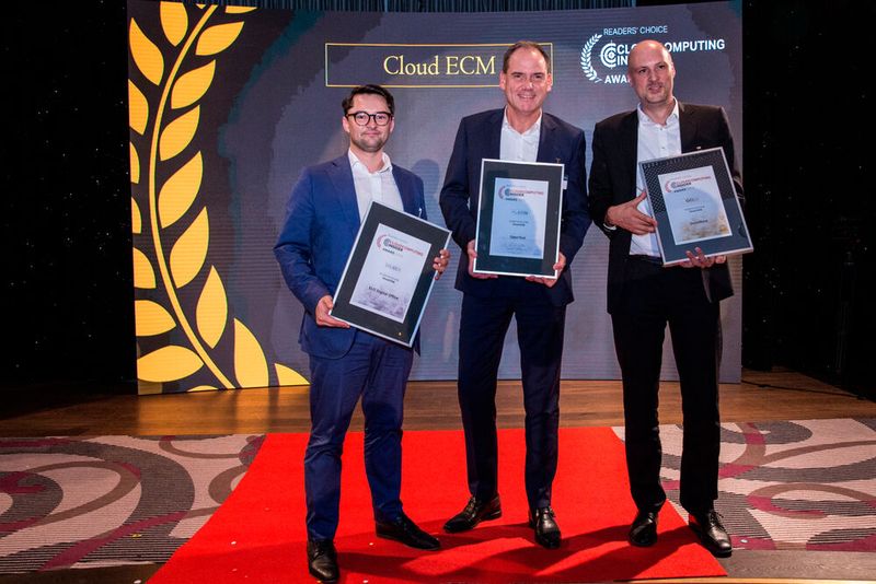 Silber in der Kategorie Cloud ECM gewinnt ELO Digital Office, vertreten durch Arthur Schummer (li.), Gold geht an DocuWare mit Alexander Scheubner (re.) und Axel Kock (m.) freut sich über Platin für OpenText. (Bild: artful rooms / VIT)