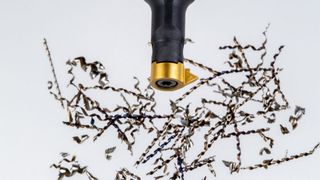 Thread turning with a laser-machined chip-breaker geometry produces chips that can be guided out of the machining zone in a controlled manner while maintaining the same cutting parameters. (Source: Simtek)