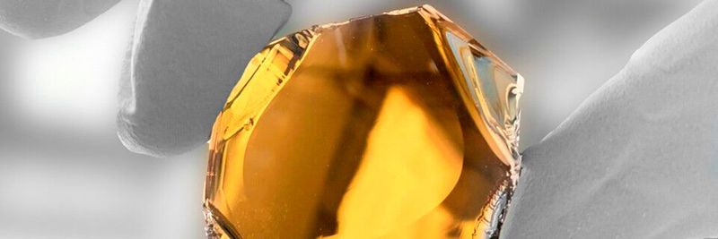 This image shows a 43 mm diameter aluminum nitride crystal. This image shows a 43 mm diameter aluminum nitride crystal.
