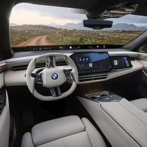 The workspace is digital and tidy, and the interior is overall elegantly furnished.(Source:  BMW)