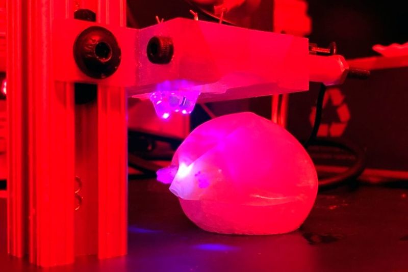 MIT engineers demonstrated a bariatric balloon that can be inflated in the stomach and then degraded by shining light on the seal, which is made of a novel light-sensitive polymer. (Ritu Raman)