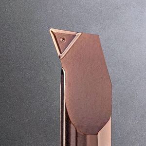 Close-up of the Supermini type 105 insert, showing the chip-breaker topology that is pressed into the green blank before sintering.(Source:  Horn Cutting Tools)