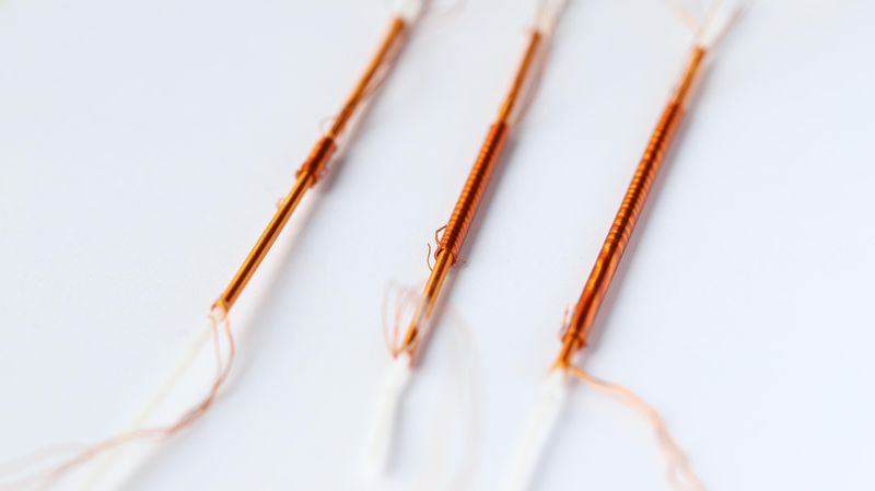 The component, consisting of two nested fibers wrapped with electrodes, generates enough force to power soft robots. (Source: EPFL)