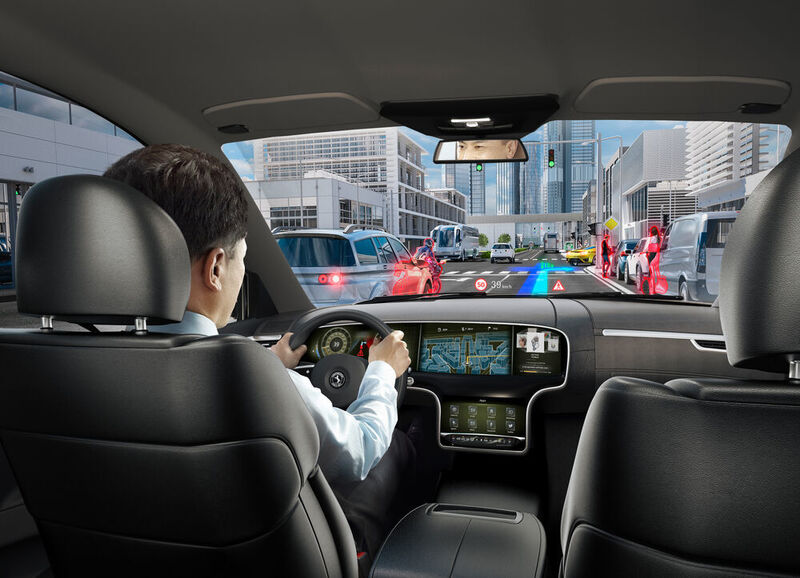 Das Head-up-Display wird hierbei genutzt, um im Sichtfeld des Fahrers virtuelle Hinweise einzuspielen, die sich in seine Straßenansicht einfügen, wie hier von Continental gezeigt. (Continental)