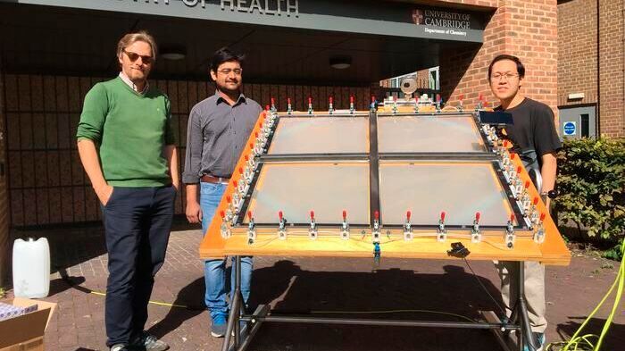Reisner and team with the solar-powered reactor that can convert plastic waste into clean hydrogen fuel outside Cambridge University's Chemistry Department.(Source:  University of Cambridge)