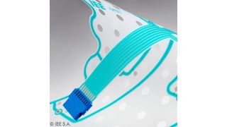 Temperatursensor: Siebgedruckte Schaltungen in Kombination mit SMD-NTC-Bauelementen, ein Beispiel für gedruckte Hybrid-Elektronik. (IEE)