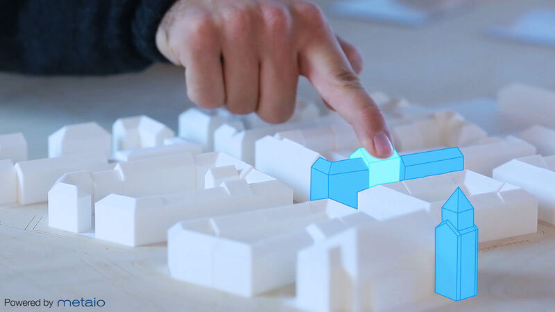 Anwendungsszenarion Architektur: Reale Modelle lassen sich um virtuelle Objekte ergänzen und diese manipulieren. (Metaio)