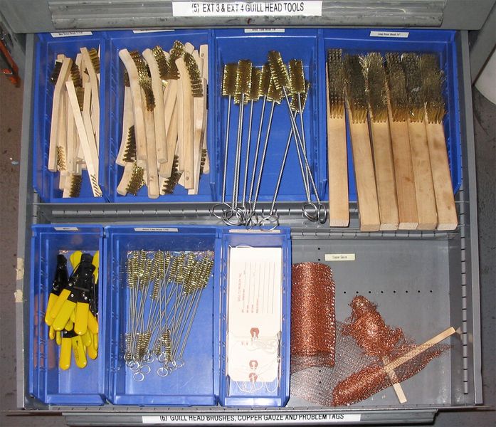 Working from your dedicated tool cart, follow the die manufacturer's instructions for reassembly.  (Source: Guill)