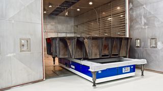 A CFRP aircraft component on its way into the enormous oven, where it cures at temperatures of up to 400°C (approx. 752°F). (Source: Ralf Högel)