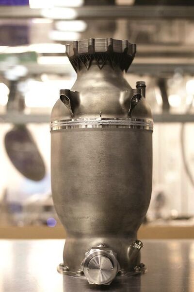 Fig. The firm SpaceX produces the combustion chamber with regenerative cooling of the  SuperDraco rocket engine from a metallic powder by 3D printing.
 (MM Industrial Spectrum, Serial Innovations, Part 7, Tomáš Michálek, MakersLab Prague)