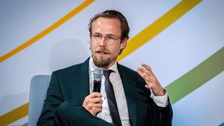 Dr.-Ing. Christian Geiss, founder and managing director of Clockwork X GmbH—a subsidiary of the TÜV Austria Group—presents "Cyber Resilience Act Live" at Cadfem on November 4, 2025, in Salzburg. (Image:Clockwork X / TÜV Austria)