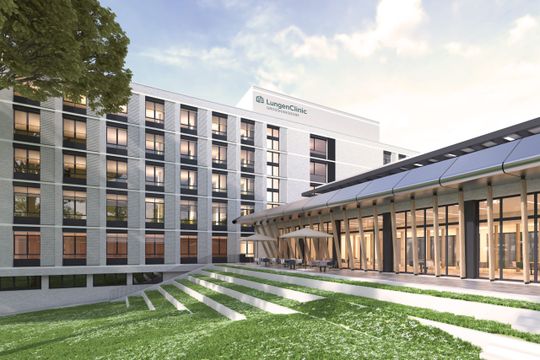 (Bild: Das neue und funktionalere Bettenhaus der Fachklinik bietet mehr Platz und soll etwa ein Drittel weniger Energie verbrauchen als der Altbau. Bildquelle: Henke + Partner)
