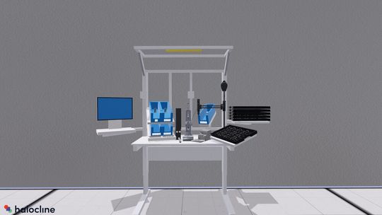 Der Montagetisch im virtuellen Fabrikraum: Die Projektteilnehmer können sich über eine VR-Brille mit ihrem Avatar frei im Raum bewegen und die Montageabläufe am Tisch testen.(Bild:  Sanner)