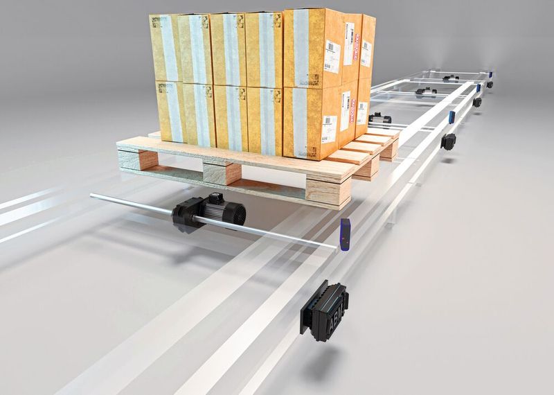 Kettenförderer für Paletten-Transport: Für schwere Lasten eignen sich ABM Flachgetriebemotoren kombiniert mit dem ABM Umrichter. (Bild: ABM Greiffenberger Antriebstechnik GmbH)