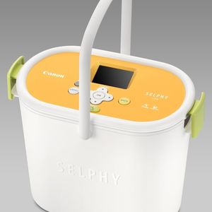 Steckt der Thermosublimationsdrucker CP770 im Vorratsbehälter, lassen sich Zubehör und Verbrauchsmaterial mit auf Reisen nehmen.