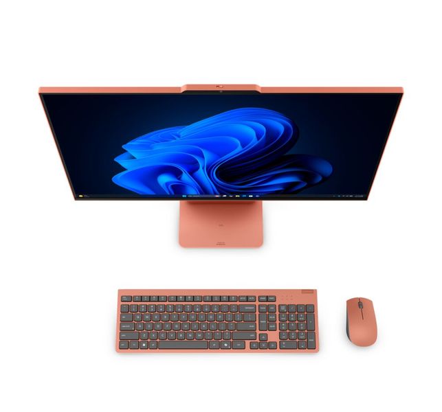 Mit der optional erhältlichen Essential Wireless Combo Gen 3 aus drahtloser Maus und Tastatur bietet Lenovo in der Farbe passende Eingabegeräte an. Hier in der Farbe Radiant Coral vor einem IdeaCentre AIO i mit 27-Zoll-Display. (Bild: Lenovo)