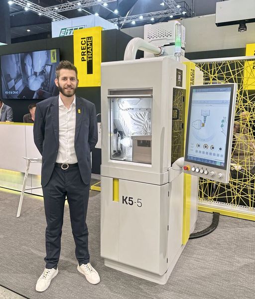 Kevin Grubenmann, Ingénieur de vente chez Precitrame Machines SA à l'AMB 2026. (Source : Margaux Pontieu)