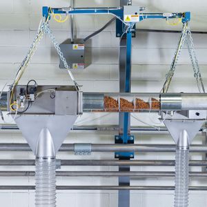 10 and 15 cm diameter Flexi-Disc tubular cable conveyors shown with Tubular Discharge Valves for selective discharging of material into downstream equipment.