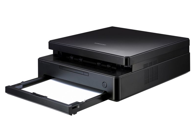 Trotz geringer Abmessungen verfügen sowohl Drucker als auch Multifunktionsgerät über eine vollwertige Papierkassette. (Archiv: Vogel Business Media)