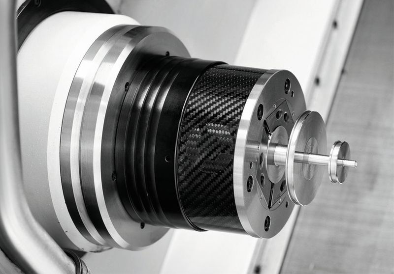 Germany-based Hainbuch will be introducing a range of new products covering workholding and automation solutions. Seen here is one of the company's company's carbon fibre reinforced plastic (CFRP) workholding in action. (Source: Hainbuch)