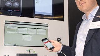 Gilles Quintelier demonstrates Rockwell Automation’s Factory Talk Team One and Factory Talk Analytics smart systems for device maintenance. (Butcher/CHEMICAL ENGINEERING)