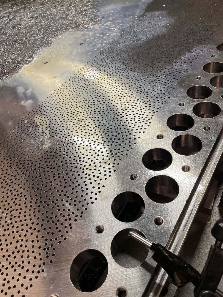 The base plate on the Hurco VMC.