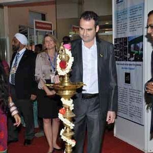 Guests of honour lighting the lamp at the inauguration