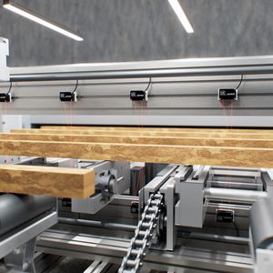 When measuring board contours in edging machines, Opto-NCDT 1220 laser sensors are mounted every 30 to 50 cm to measure the profile of the boards as they enter crosswise. Via IO-Link, the numerous sensors can be centrally integrated, uniquely assigned, and configured.(Source:  Micro-Epsilon Messtechnik GmbH & Co. KG)