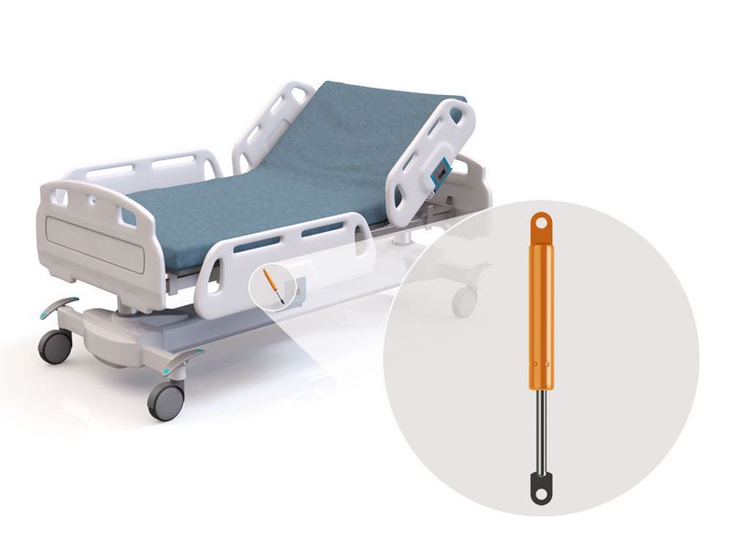 Groß (Bett) und Klein (Dämpfer) im Vergleich: Der Suspa-Dämpfer HD 15 kann in sehr kleinen Bauräumen installiert werden. (Suspa)