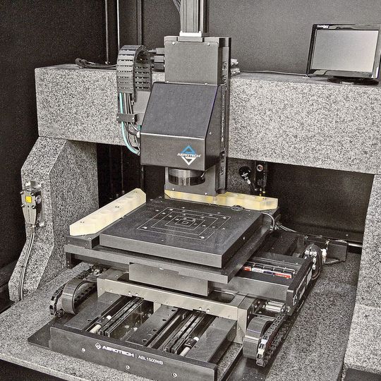 An XY positioning system using interferometer feedback at the working plane to minimise abbe error influences at the work point. An XY positioning system using interferometer feedback at the working plane to minimise abbe error influences at the work point.