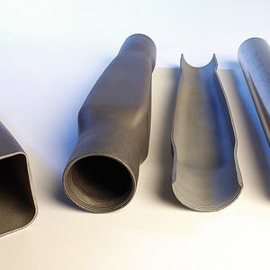 Beispiele von warmumgeformten Bauteilen aus höchstfesten Stählen.