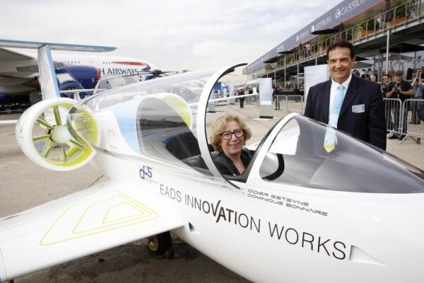 EADS at Paris Air Show Le Bourget 2013. Geneviève Fioraso Minister of Higher Education and Research visits EADS at the Le Bourget Paris Air Show 2013. Geneviève Fioraso tryes out the E-FAN EADS Innovation Works electric plane. Left to right: Geneviève Fioraso Minister of Higher Education and Research, EADS CTO Jean Botti  (Airbus Group)